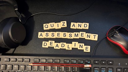 tiles spelling out 'quiz and assessment deadline'